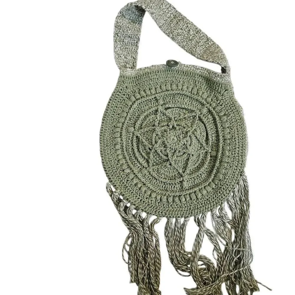 Handmade crocheted sage green boho purse with fringe.